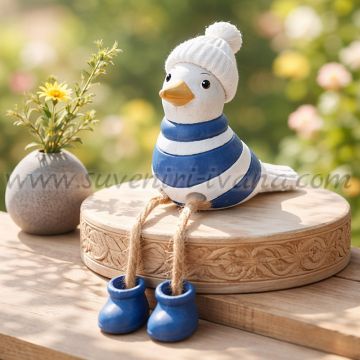 декоративна фигурка птиче със синьо райе и висящи крачета