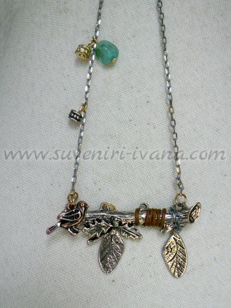 Vintage necklace branch with leaves and bird